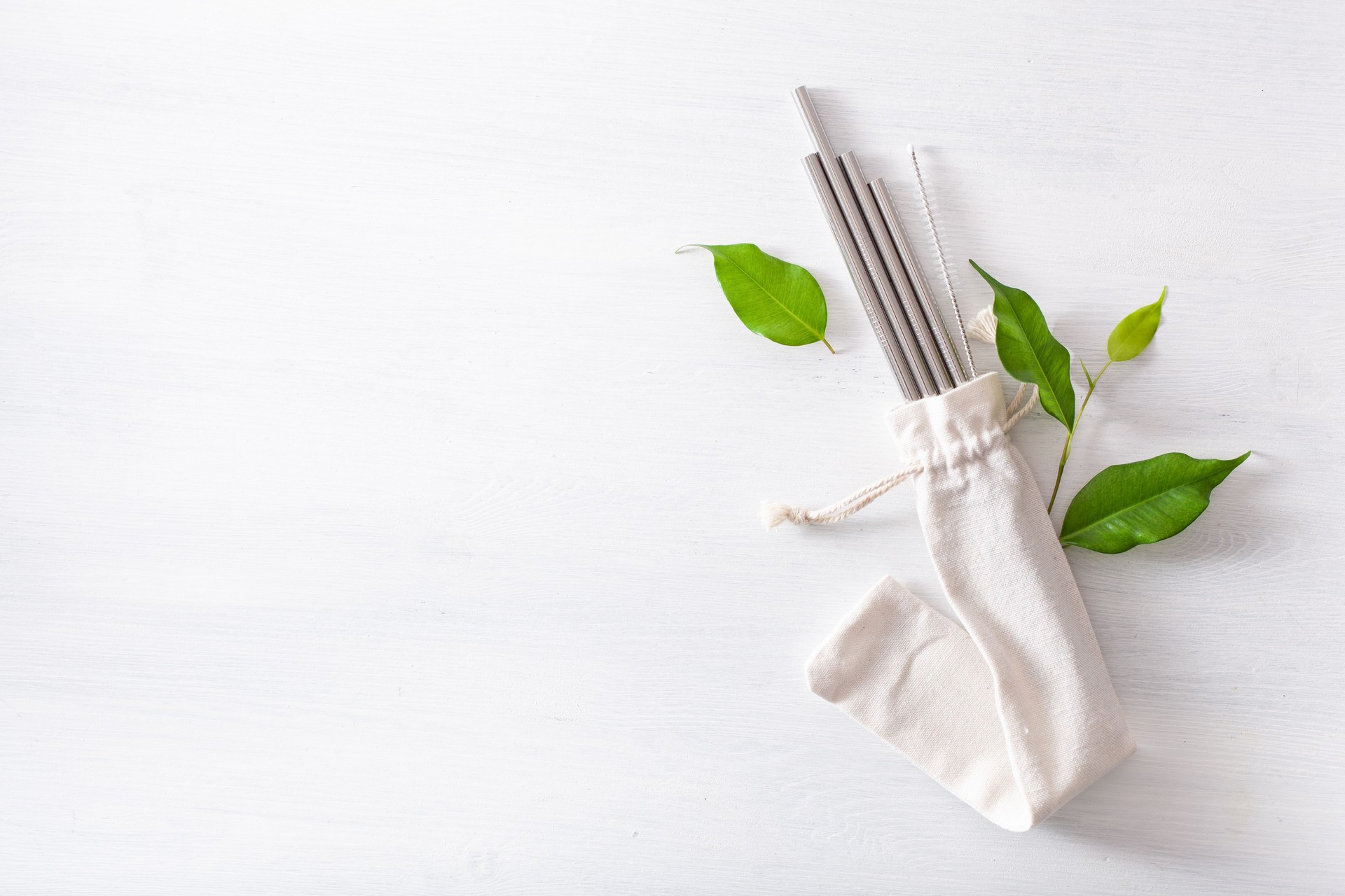 eco-friendly reusable metal drinking straw. zero waste concept